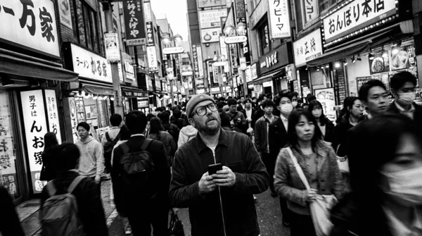Lost traveler amidst the rushing crowds of Tokyo